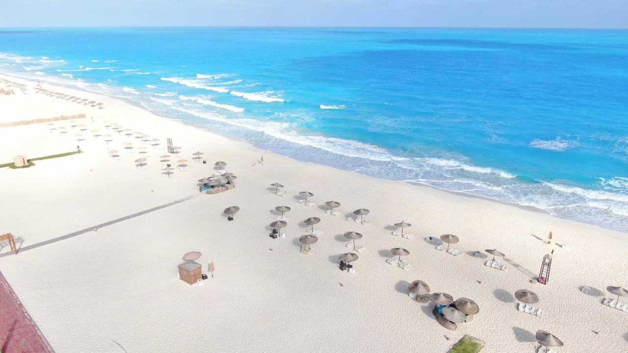 Tolip North Coast Hotel El Alamein Exterior photo Aerial view of the beach