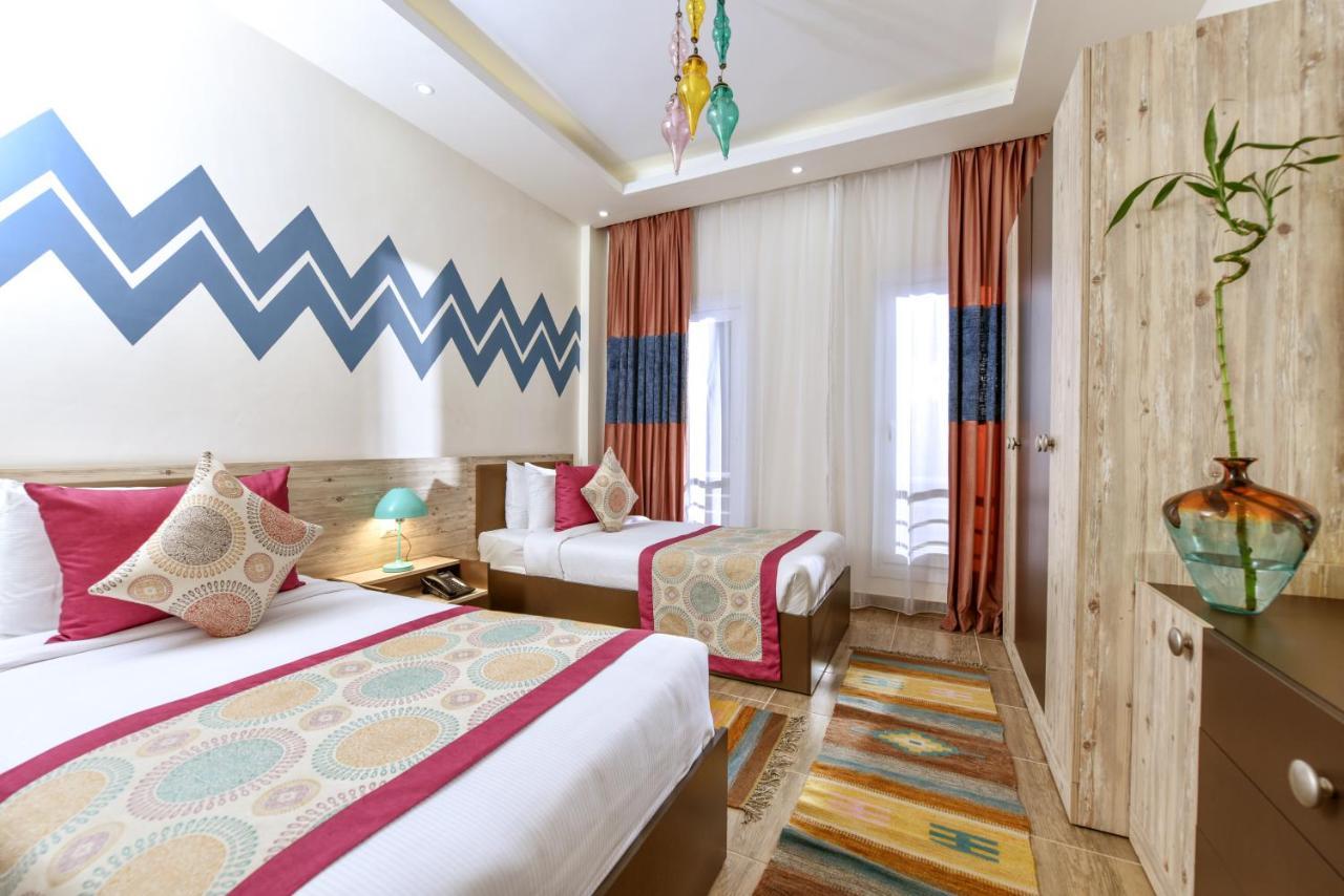 Tolip North Coast Hotel El Alamein Exterior photo A room at the hotel