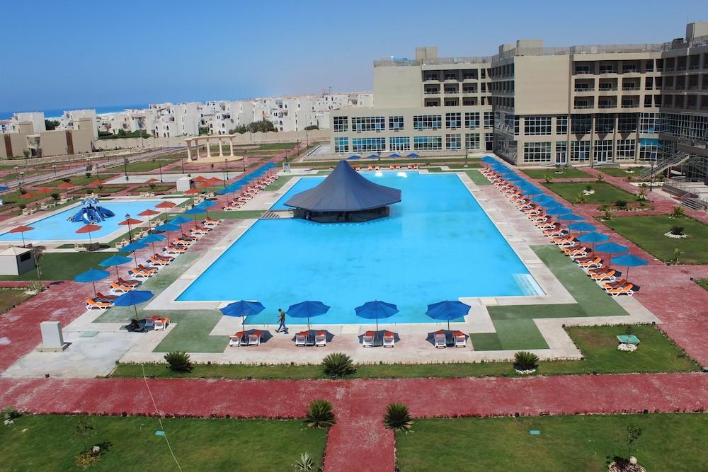 Tolip North Coast Hotel El Alamein Exterior photo The swimming pool at the hotel