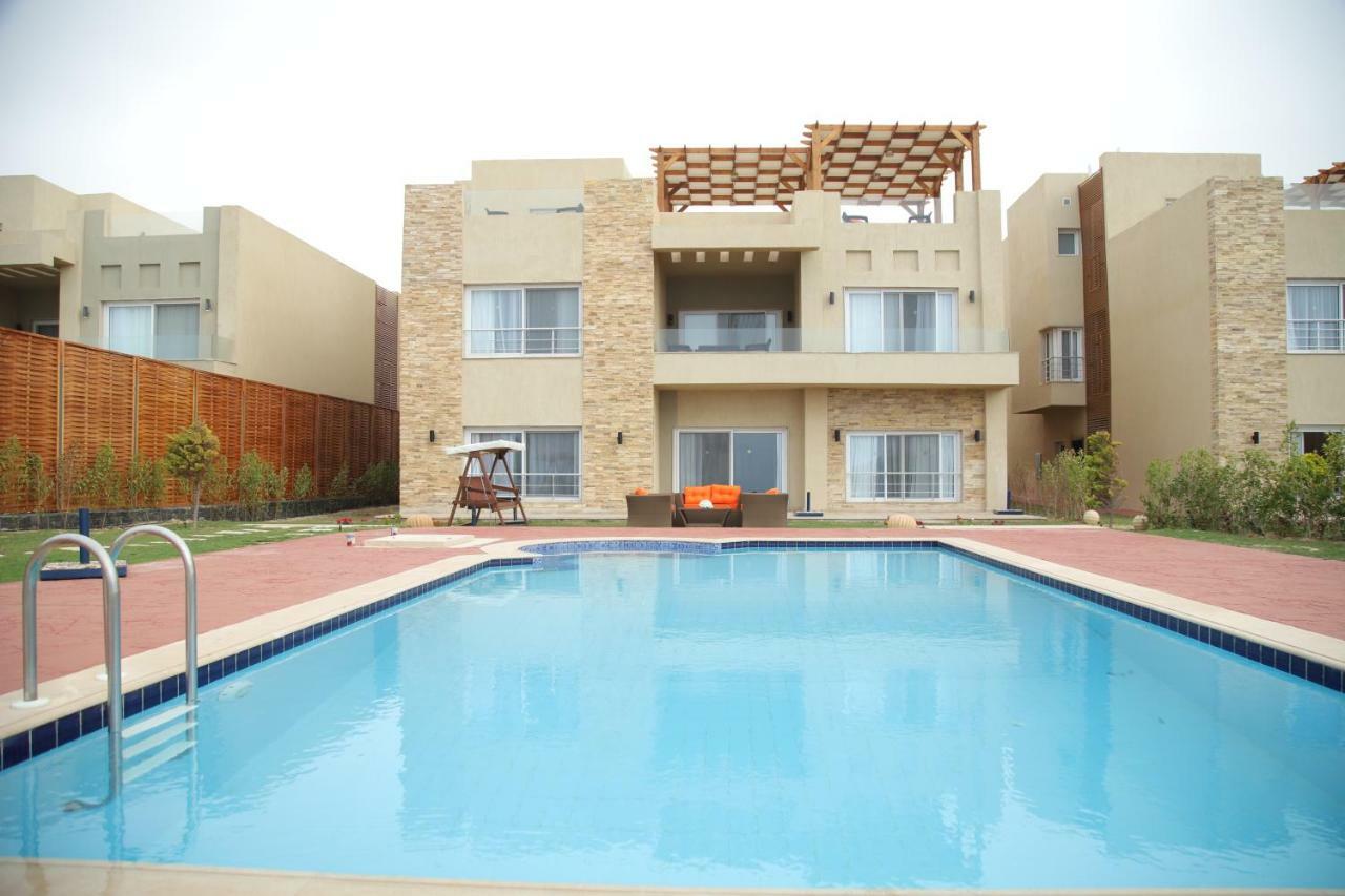 Tolip North Coast Hotel El Alamein Exterior photo A villa in the resort